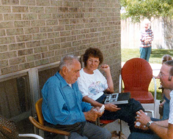 Jacob Mahler, Florence (Mahler) Boyd, and Frank J. Boyd talking